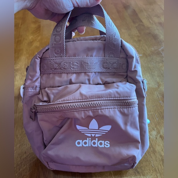 adidas Handbags - NWOT small adidas backpack in blush pink. Lots of compartments! Super cute!